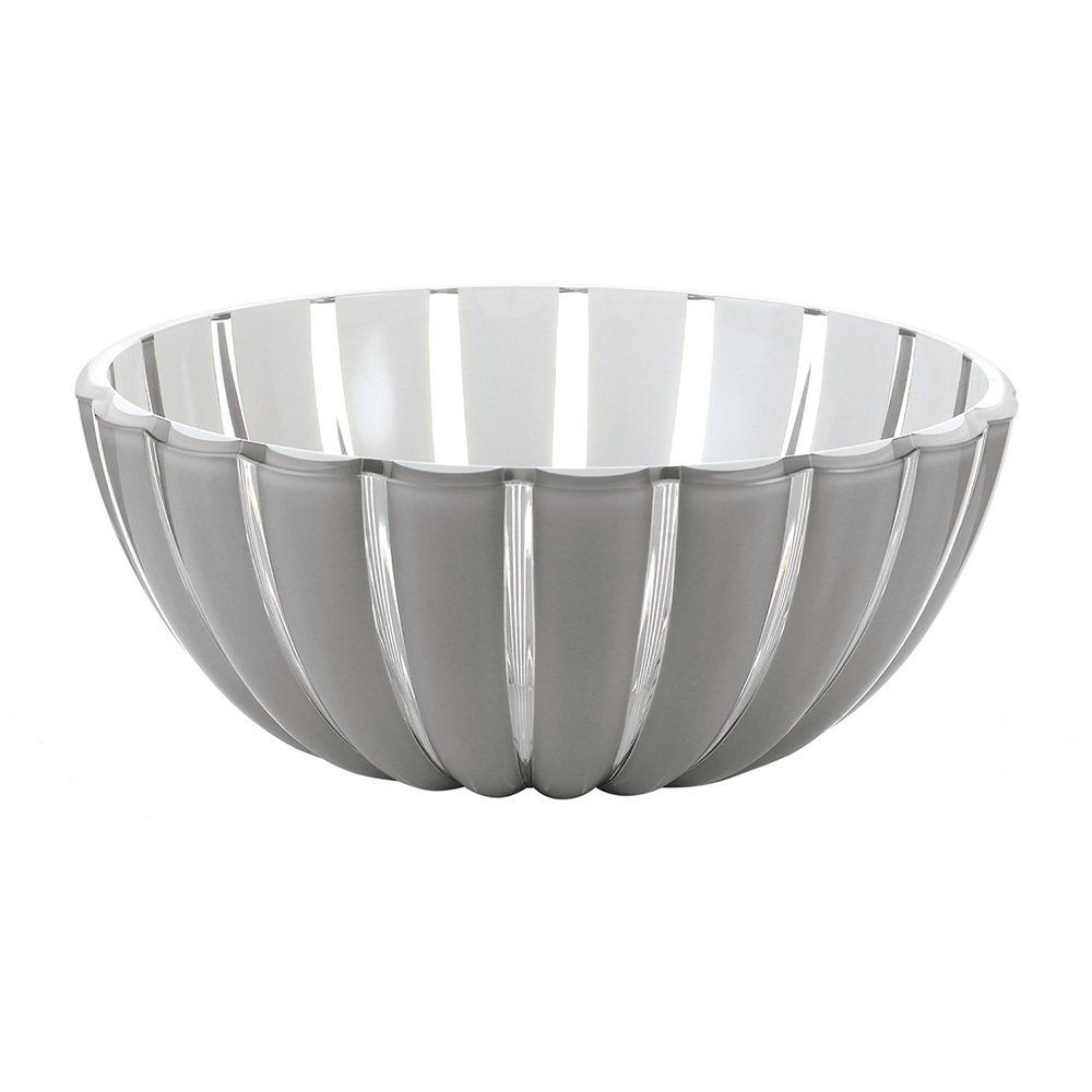 Салатница Guzzini Grace 30 см серая 29693092 Салатница Guzzini Grace 30 см серая 29693092Посуда Guzzini (Италия)<br>Салатница Guzzini Grace 30 см серая 29693092<br> <br>Салатница Grace выглядит настолько изящно, что кажется, будто она сделана из стекла. Её главный секрет - необычная форма, в которой внешние, объемные и волнообразные края контрастируют с белоснежной и гладкой внутренней поверхностью. Вместе они образуют уникальный рельефный эффект, который усиливается на свету. Вместительность салатницы позволит использовать её для подачи фруктов, десертов, закусок и основных блюд. Изготовлена из прочного и ударостойкого пластика высшего качества. Можно мыть в посудомоечной машине.<br>Официальный продавец<br>