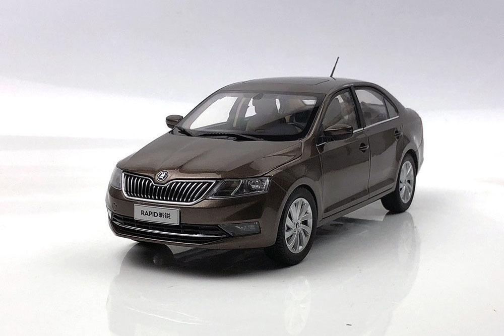 Коричневый skoda rapid